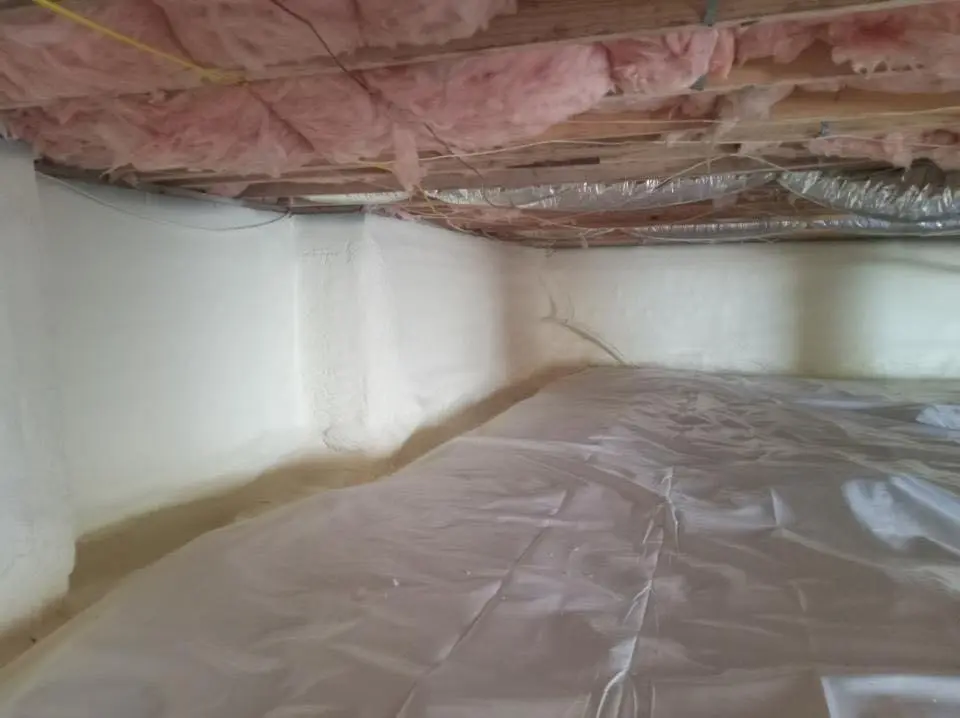 Crawl space encapsulation with closed-cell spray foam for Commercial Roof Restoration in Middlesex